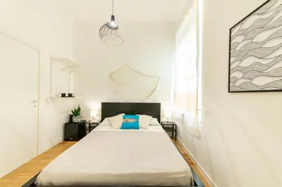Letto o letti in una camera di Lele's Rooms