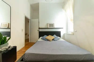 Letto o letti in una camera di Lele's Rooms