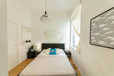Letto o letti in una camera di Lele's Rooms