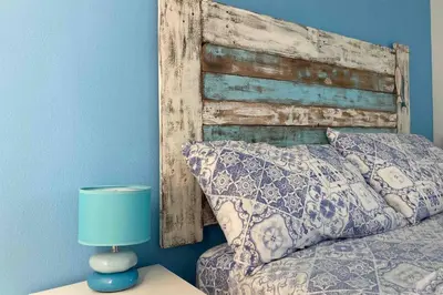Letto o letti in una camera di Flamingo's House in Sant'Antioco, Sardinia