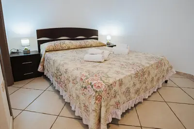 Letto o letti in una camera di Sardinia's house WIFI Sea Hills and mining history