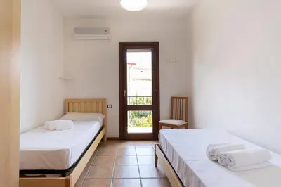 Letto o letti in una camera di Mirto 4 Apartment