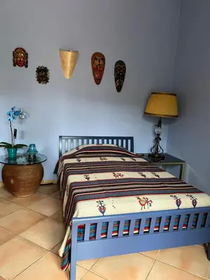 Letto o letti in una camera di Villa Iris
