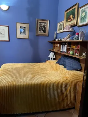 Letto o letti in una camera di Villa Iris
