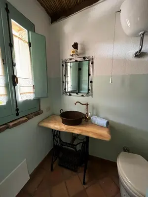 Bagno di Graziosa stanza campidanese Su terzu