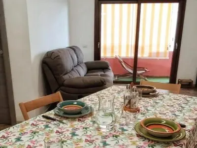 Area soggiorno di Al 28ᴀ , Appartamento Teulada