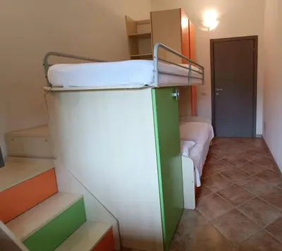Letto o letti in una camera di Al 28ᴀ , Appartamento Teulada
