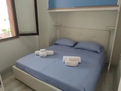 Letto o letti in una camera di holiday house 