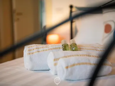Letto o letti in una camera di La Terrazza della Marina