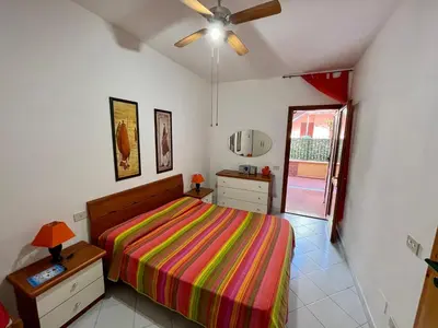 Letto o letti in una camera di Appartamento Teresa By La Via Del Mare Viaggi e Vacanze