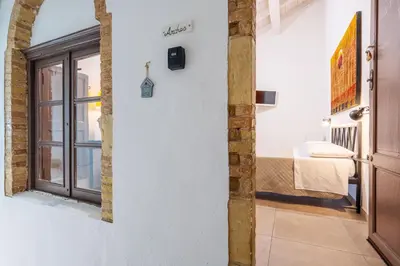 Letto o letti in una camera di Villa Campidanese