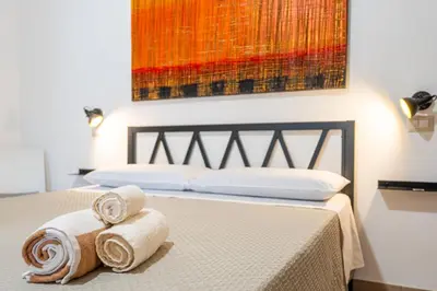 Letto o letti in una camera di Villa Campidanese