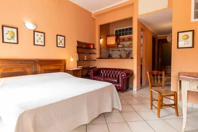 Letto o letti in una camera di LariBiancos Cagliari CENTRO STORICO