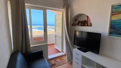 TV o dispositivi per l'intrattenimento presso Appartamento vista mare Buggerru