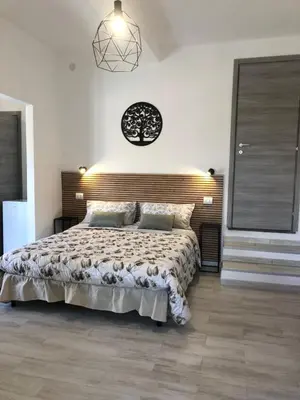 Letto o letti in una camera di Domus Alessia