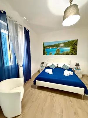 Letto o letti in una camera di B&B Nonna Olga