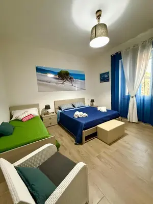 Letto o letti in una camera di B&B Nonna Olga