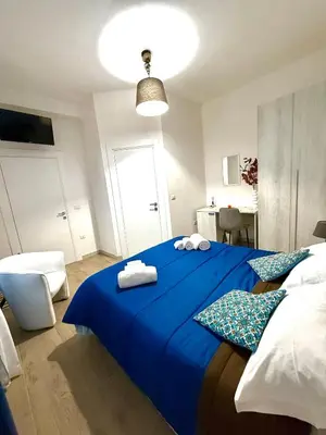 Letto o letti in una camera di B&B Nonna Olga