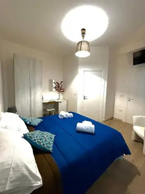 Letto o letti in una camera di B&B Nonna Olga