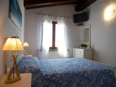 Letto o letti in una camera di L'Isola Bella Tanca Piras
