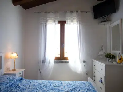 Letto o letti in una camera di L'Isola Bella Tanca Piras