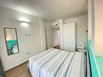 Letto o letti in una camera di Casa Meli