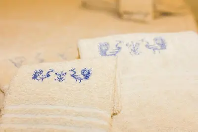 Letto o letti in una camera di Antica Dimora del Melograno