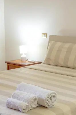 Letto o letti in una camera di Sestu house