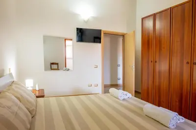 Letto o letti in una camera di Sestu house