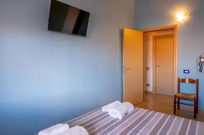 Letto o letti in una camera di Sestu house