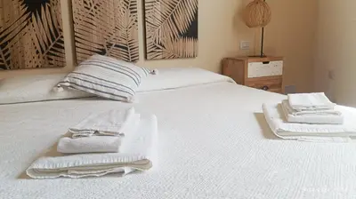 Letto o letti in una camera di BassaMarea - Una sorpresa in Centro storico