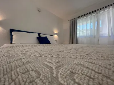 Letto o letti in una camera di Via Giardini Rooms