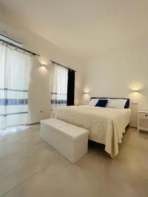 Letto o letti in una camera di Via Giardini Rooms