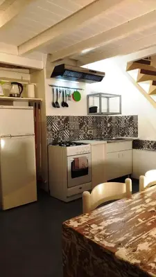 Cucina o angolo cottura di Residenze Palazzo Pes