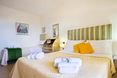 Letto o letti in una camera di Sun&Sardinia