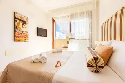 Letto o letti in una camera di Sun&Sardinia