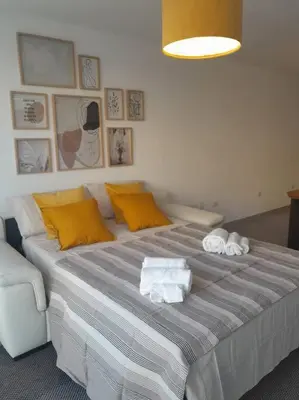 Letto o letti in una camera di Elegante monolocale Elmas Cagliari