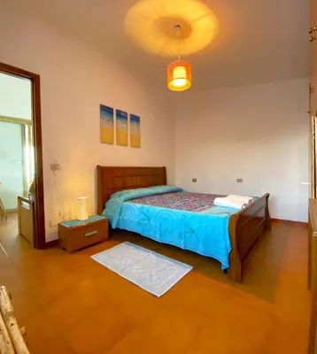 Letto o letti in una camera di Casa Fadda