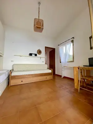 Letto o letti in una camera di Casa Fadda