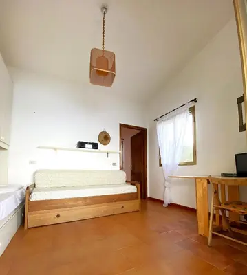 Letto o letti in una camera di Casa Fadda