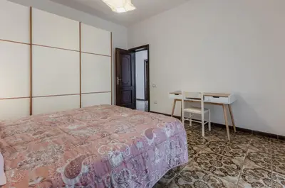 Letto o letti in una camera di GuestHost - Cagliari Comfy Apartment with Terrace & Netflix!