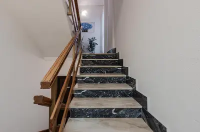 Planimetria di GuestHost - Cagliari Comfy Apartment with Terrace & Netflix!