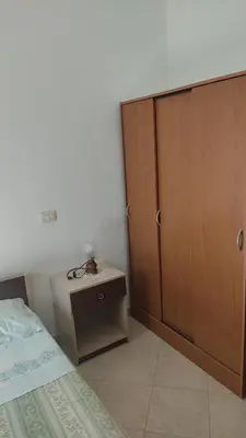 Letto o letti in una camera di Villa mimosa