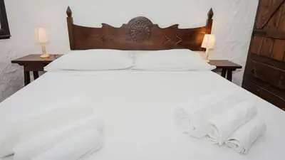 Letto o letti in una camera di Villa Chiara