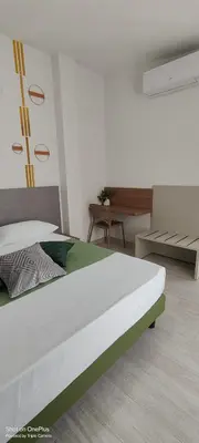 Letto o letti in una camera di Sienda Cesira