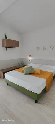 Letto o letti in una camera di Sienda Cesira