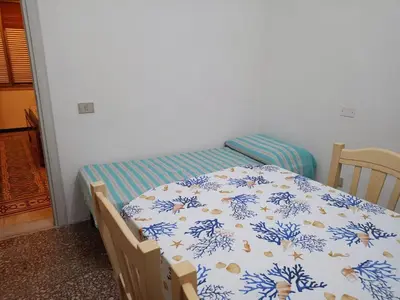 Letto o letti in una camera di La Campidanese IUN R3640