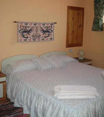 Letto o letti in una camera di Villa Primavera