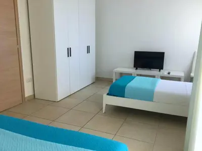 Letto o letti in una camera di Sunny House Fourteen