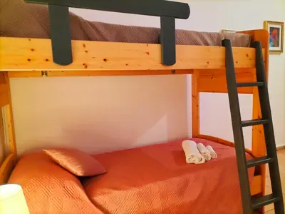 Letto o letti in una camera di Casa Marta